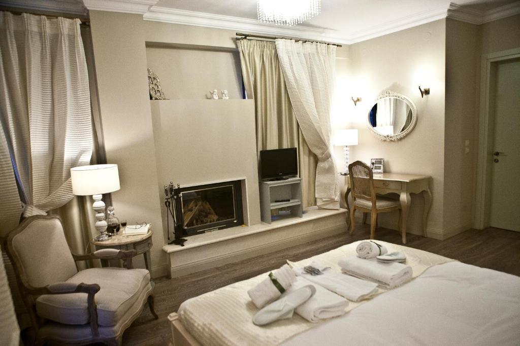 Melies Boutique Hotel Káto Loutrákion Rum bild