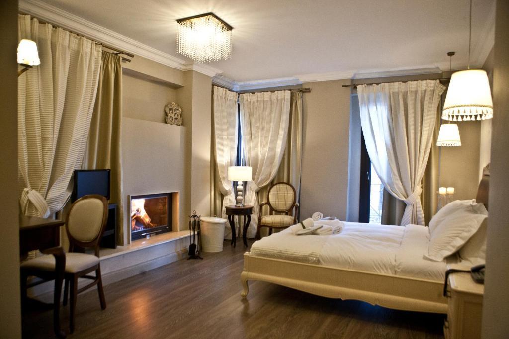 Melies Boutique Hotel Káto Loutrákion Rum bild