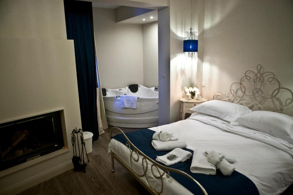 Melies Boutique Hotel Káto Loutrákion Rum bild